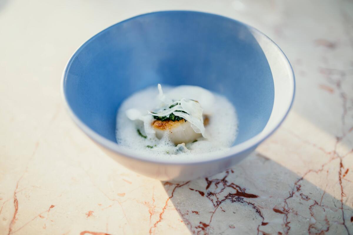 A scallop dish by chef Eric Bost at Jeune et Jolie restaurant 