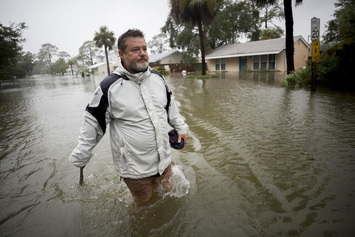 Joey Spalding walks back to his truck on Tybee Island, Ga.