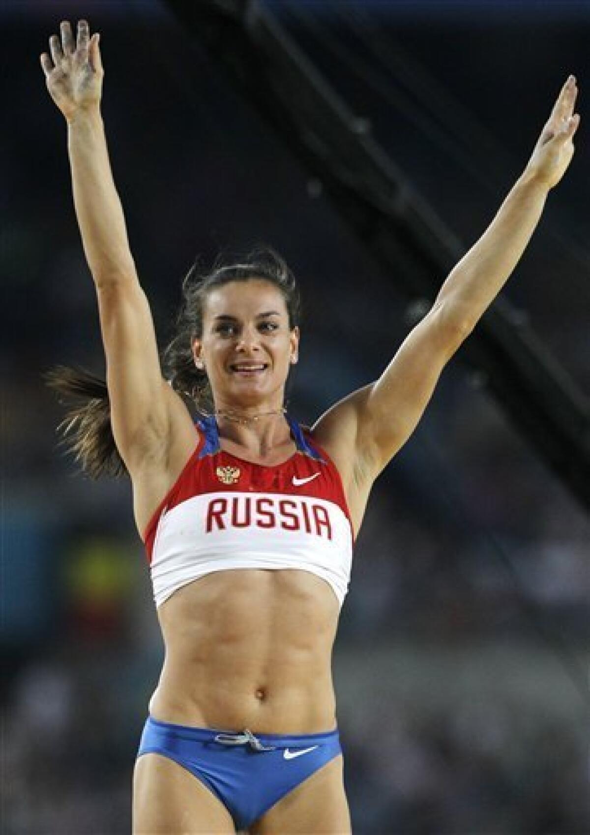 Russia's Yelena Isinbayeva reacts after clearing the bar in the Women's Pole Vault final at the World Athletics Championships in Daegu, South Korea, Tuesday, Aug. 30, 2011. (AP Photo/Kin Cheung)