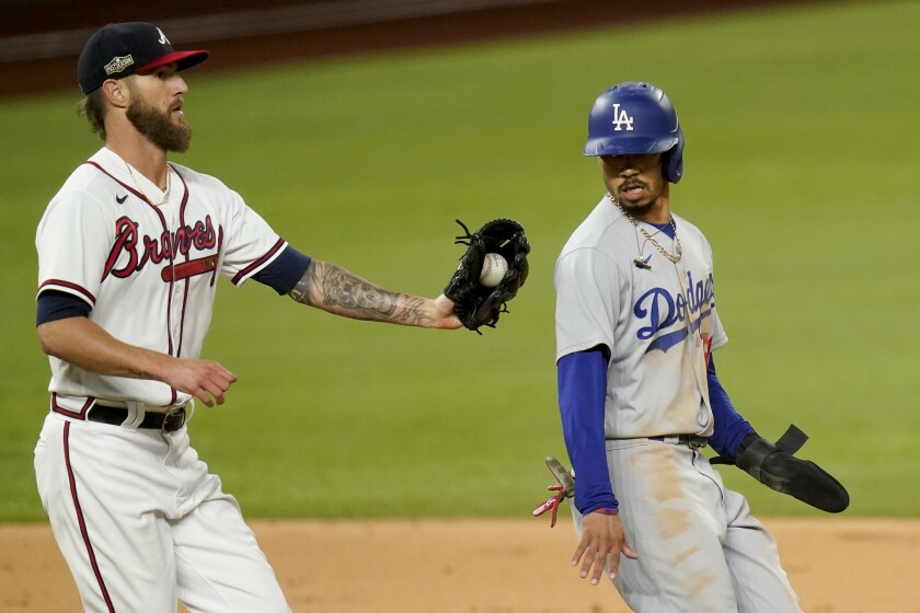 Mookie Betts is tagged out Braves pitcher Shane Greene after getting caught in a rundown.