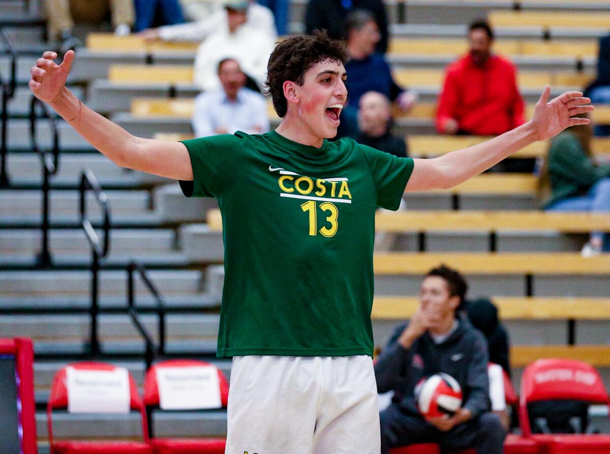 Setter Tread Rosenthal celebrates after Mira Costa High won a point during a match.