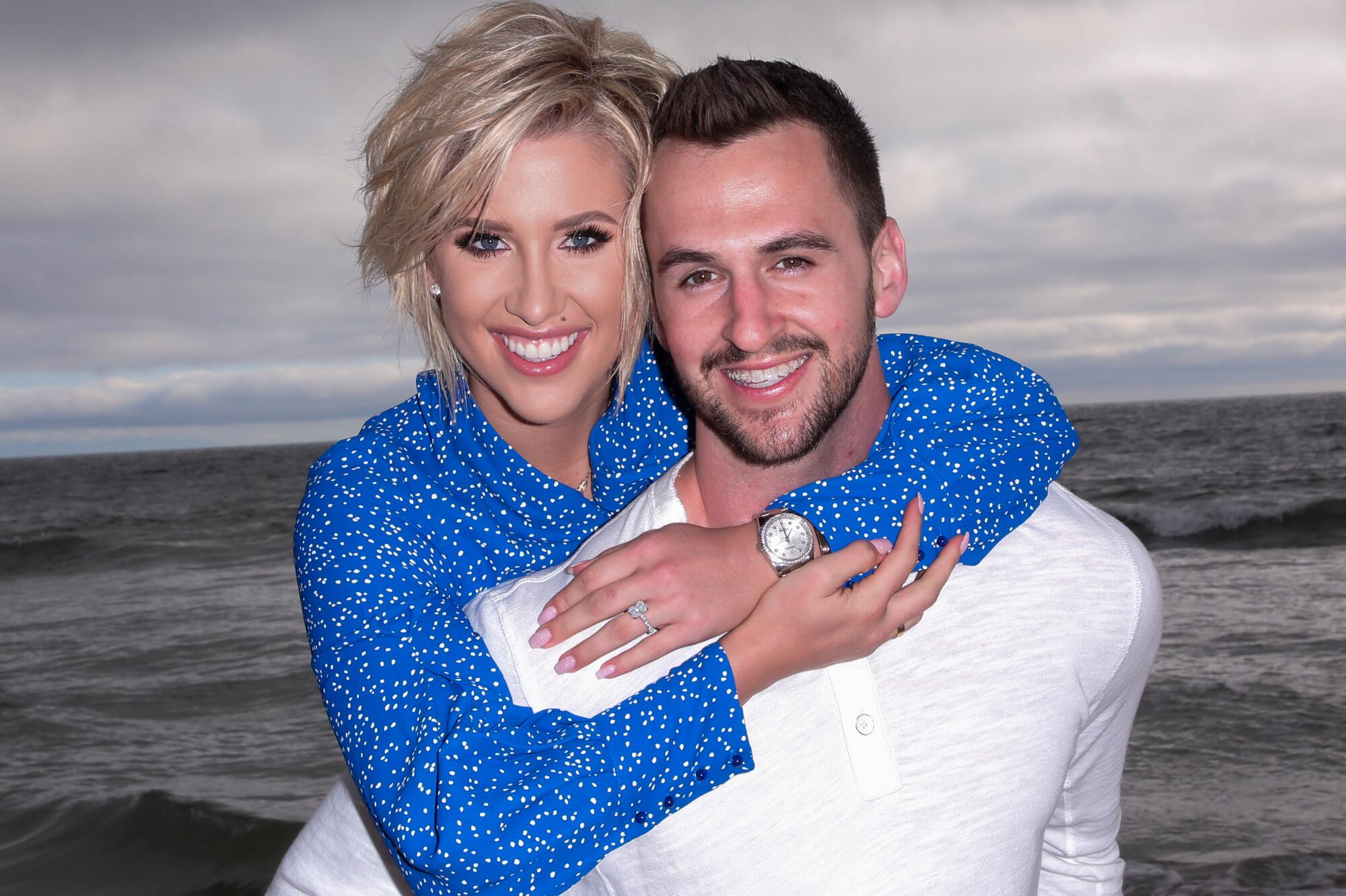 Savannah Chrisley and Nic Kerdiles pose for an engagement portrait in 2019.