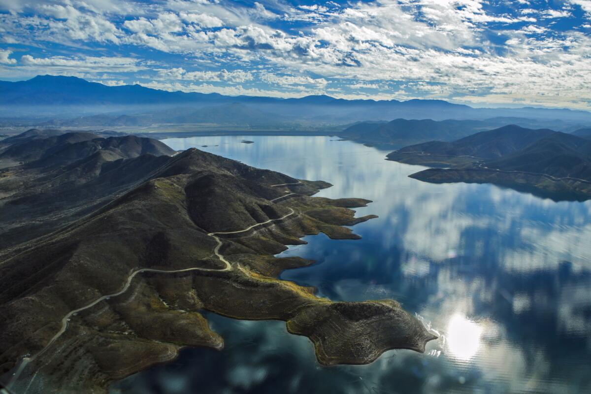 The water levels in Diamond Valley Lake, Southern California's largest reservoir, are now at the lowest level they've been since the lake was filled between 1999 and 2006. A 'bathtub ring' showing the maximum extent of the lake can be seen just under the perimeter roadway.