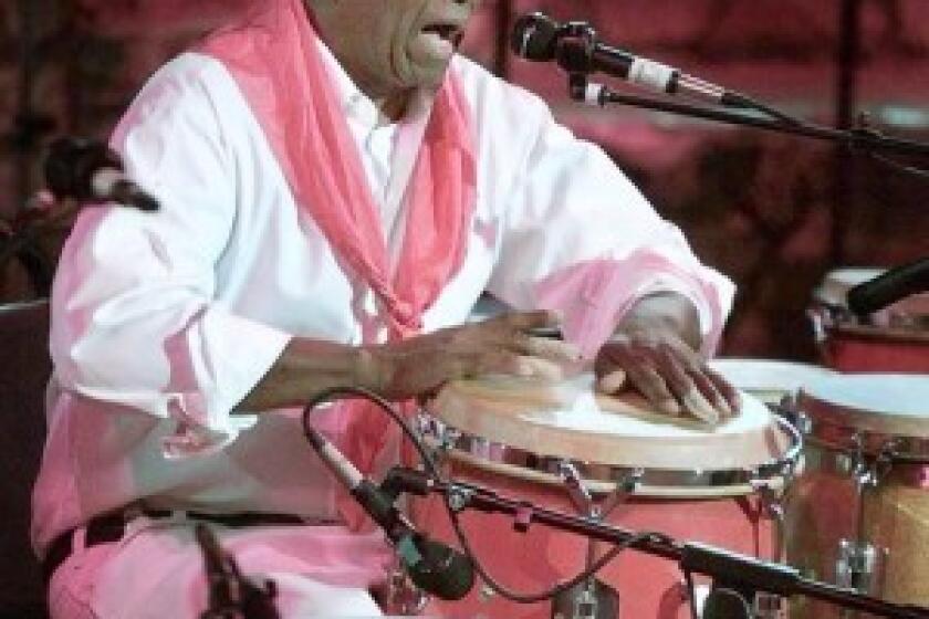 Francisco Aguabella plays the conga drums in Hollywood. He was "the master of masters," says Danilo Lozano, an ethnomusicology professor and former bandmate.