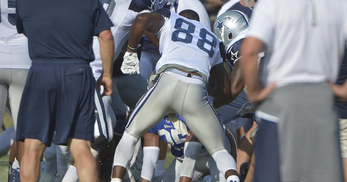 Helmet-less Dez Bryant gets punched in the face as Cowboys and Rams brawl  [Video] - Los Angeles Times