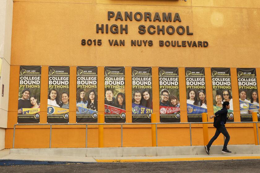 LOS ANGELES, CA - JULY 22, 2019 - Students and parents arrive for summer session at Panorama High School in the San Fernando Valley located at 8015 Van Nuys Blvd, Panorama City on Monday morning July 22, 2019 after learning that suspects in an alleged MS-13 murder were apparently attending Panorama High School. Student Brayan Andino was killed in Dec. 2017. (Al Seib / Los Angeles Times)