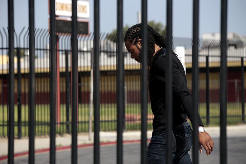 Seattle Seahawks All-Pro defensive back Richard Sherman arrives at Dominguez High in Compton, where spent much of Wednesday talking to students and filming a commercial.