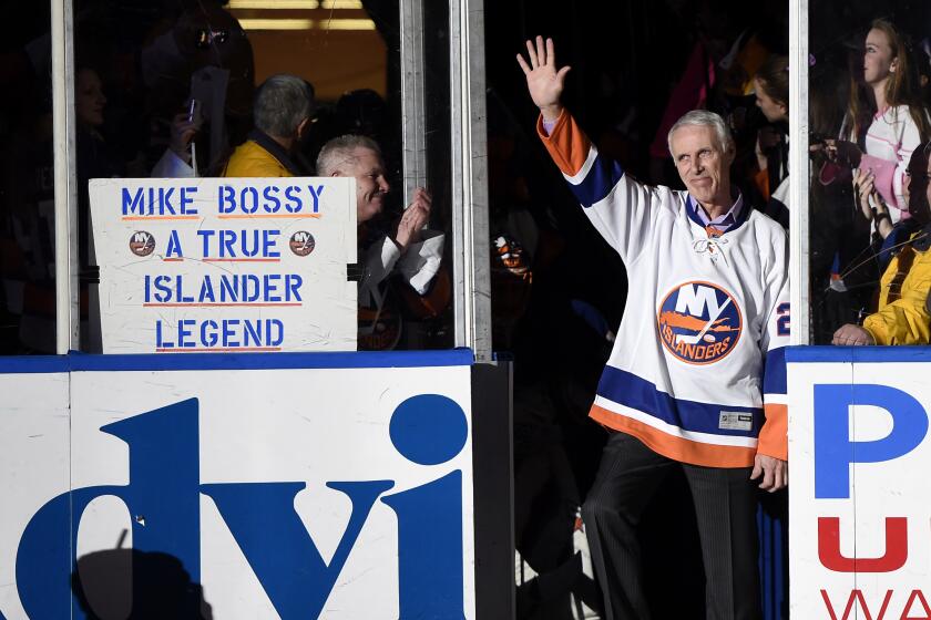 Mike Bossy is introduced before a game between the Islanders and Bruins at Nassau Coliseum on Jan. 29, 2015.
