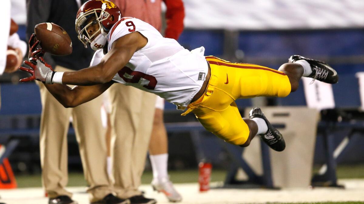 Trojans receiver JuJu Smith-Schuster can't haul in a pass during the first quarter of the Holiday Bowl on Wednesday night in San Diego.