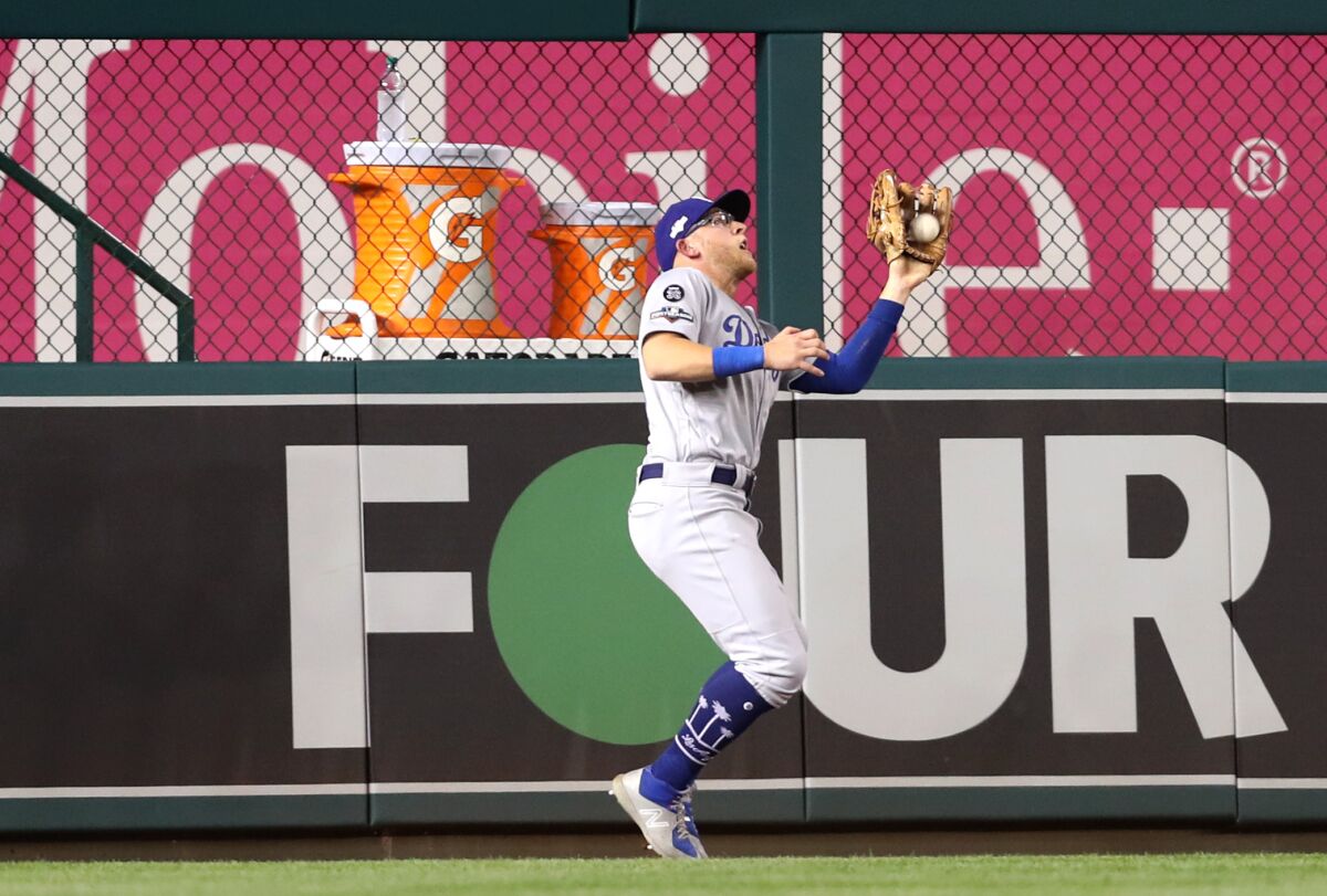 Dodgers outfielder Matt Beaty catches the sacrifice fly hit by Washington's Anthony Rendon during Game 4 of the NLDS.