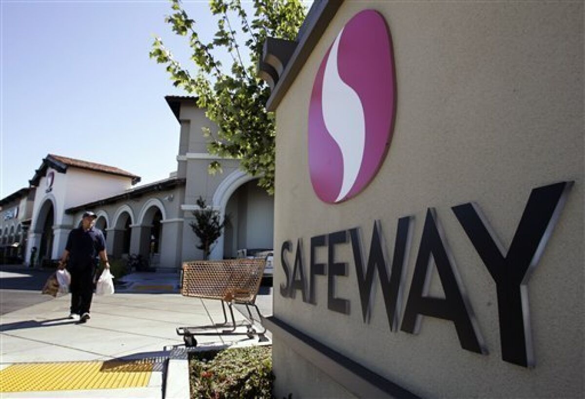 Sales down in 2Q, Safeway lowers outlook for year The San Diego Union