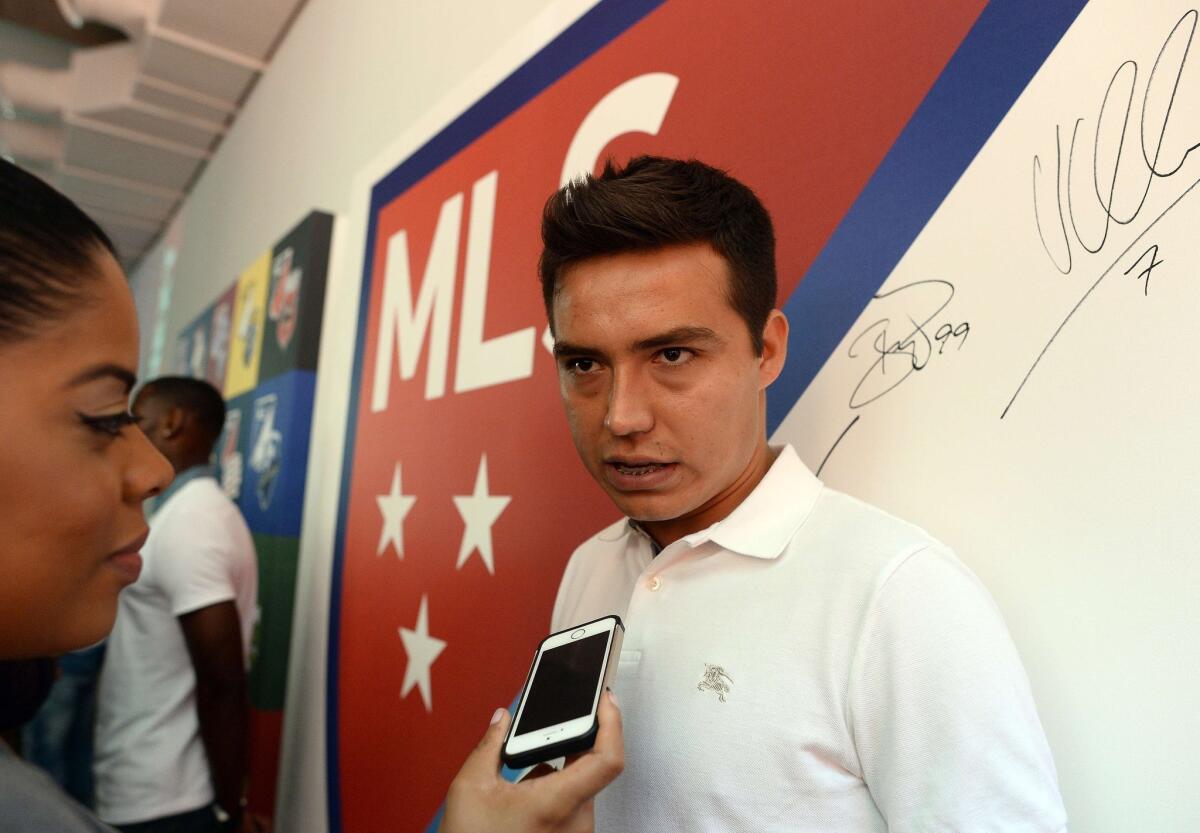 Chivas USA's Erick Torres speaks to the media earlier this week at an event unveiling the new Major League Soccer logo.