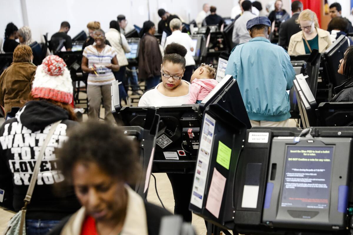 Voters cast ballots Monday in Columbus, Ohio.