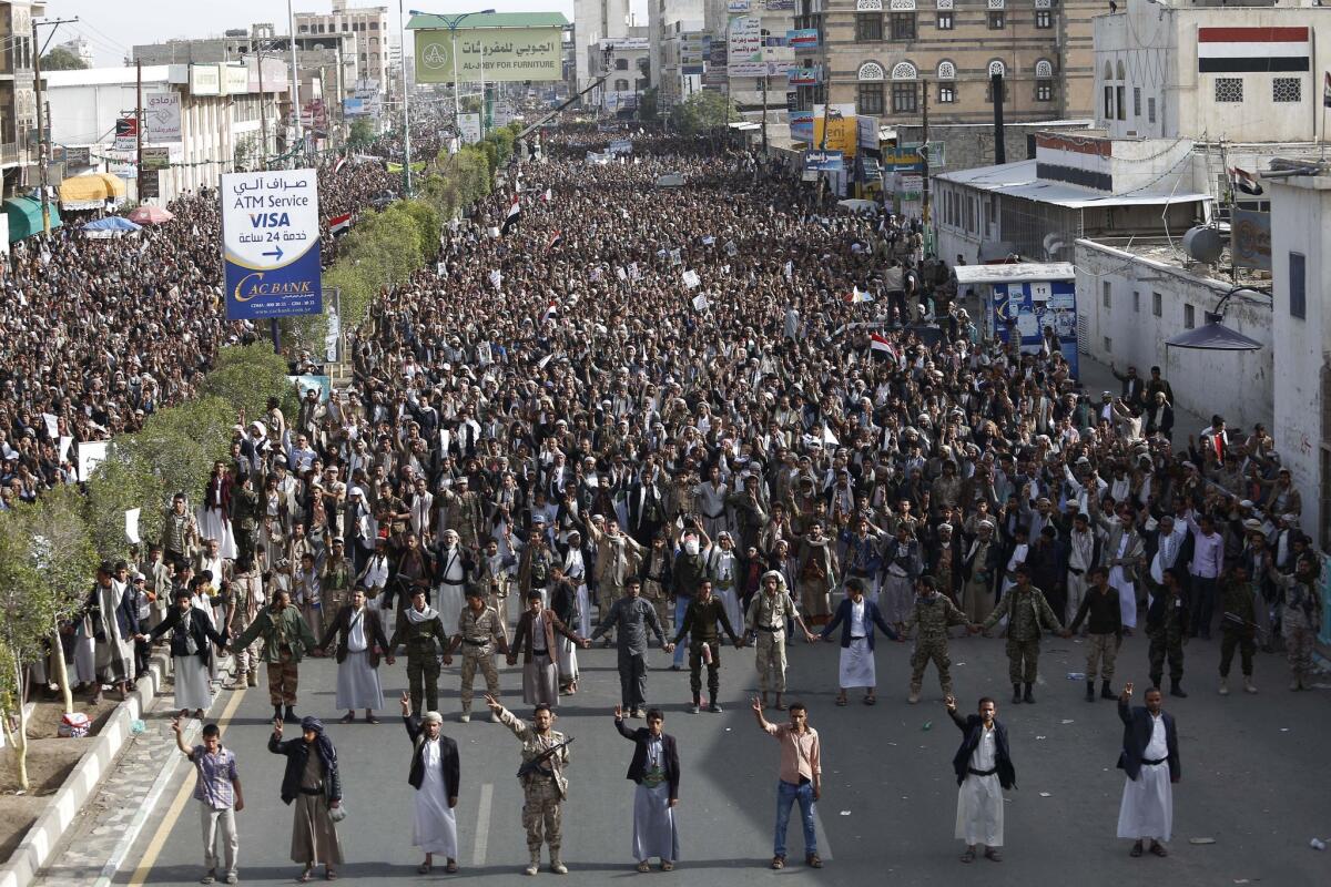 Shiite rebels known as Houthis hold a rally to denounce the Saudi-led airstrikes during a protest in Sana, Yemen, on Monday.