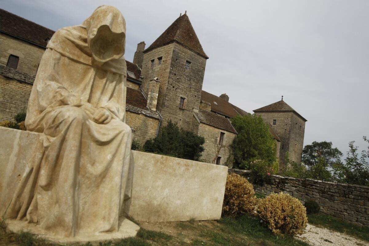 A statue outside the castle at Gevrey-Chambertin near Dijon, France.