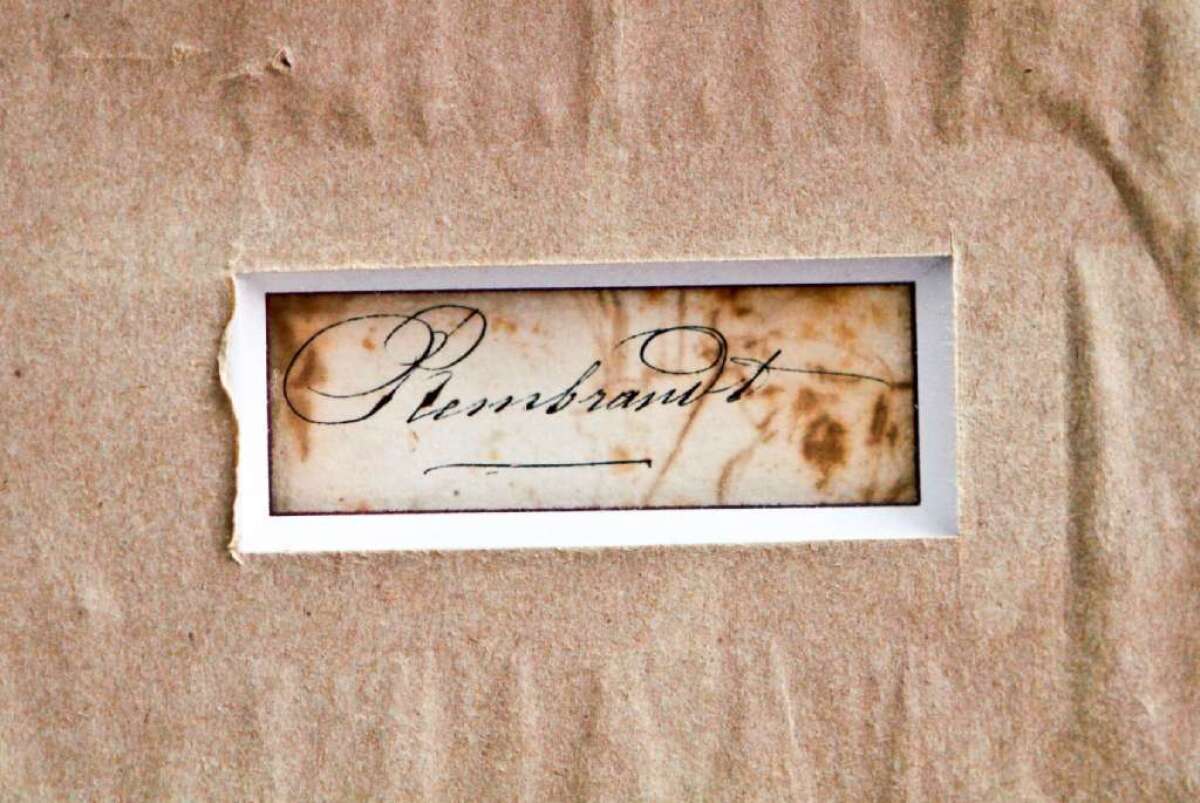 A close-up of Rembrandt signature on the back of "The Judgment," a quill etching valued at more than $250,000 that was stolen in Marina Del Rey 2011. The painting was later recovered.