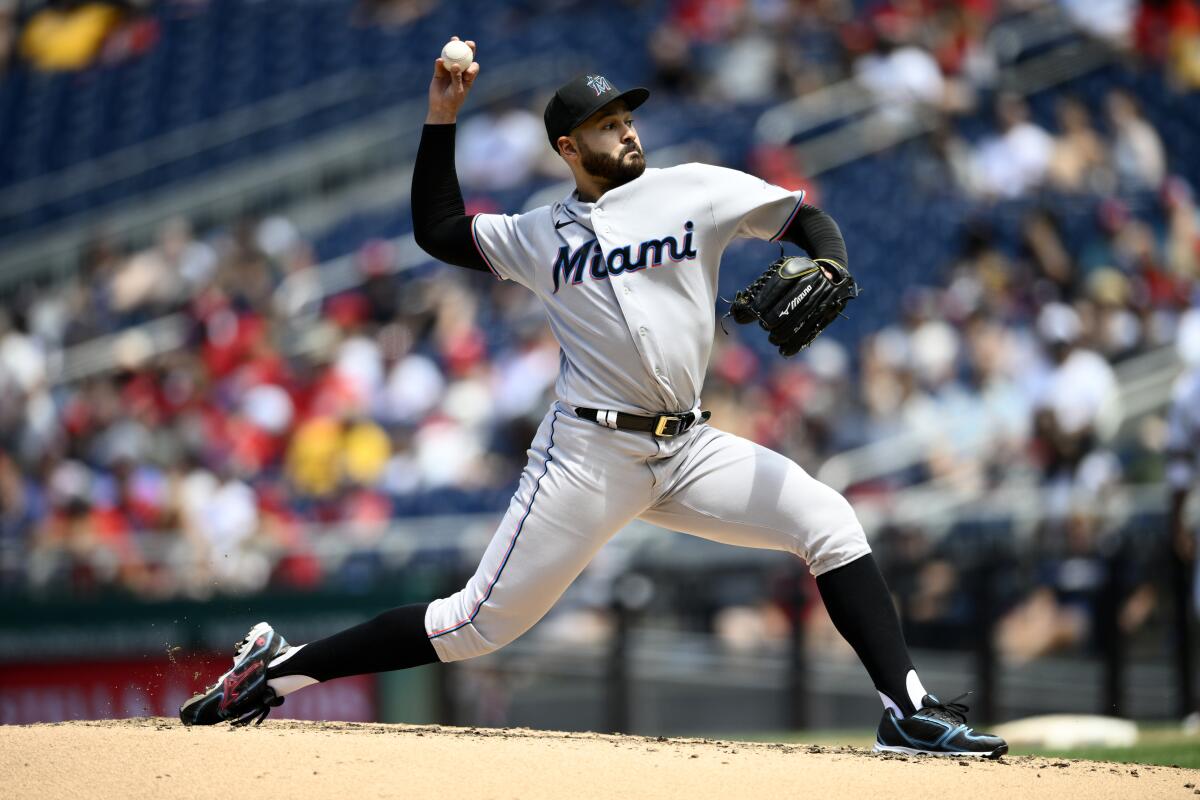 Miami Marlins starting pitcher Pablo Lopez throws during the third inning of a baseball game against the Washington Nationals, Sunday, July 3, 2022, in Washington. (AP Photo/Nick Wass)