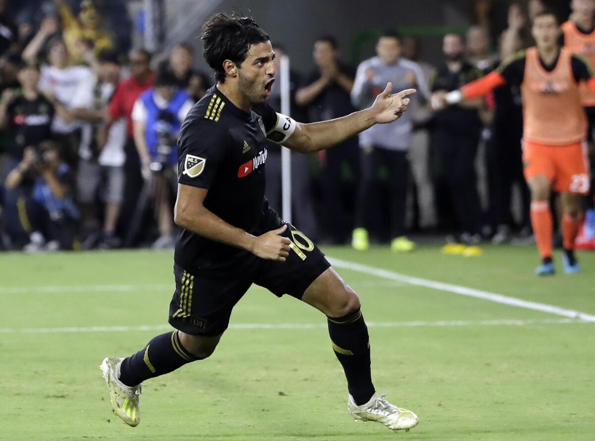LAFC's Carlos Vela celebrates after scoring against the Galaxy on Aug. 25, 2019, file photo.