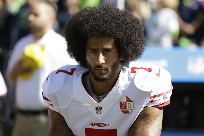 San Francisco's Colin Kaepernick kneels during the national anthem on Sept. 25.