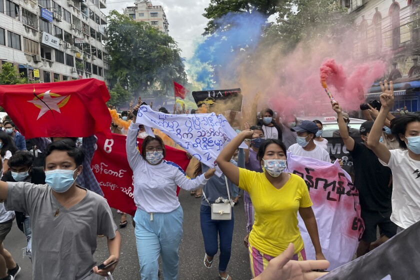 Students protest against the February military takeover by the State Administration Council as they march at Kyauktada township in Yangon, Myanmar on Wednesday July 7, 2021. (AP Photo)