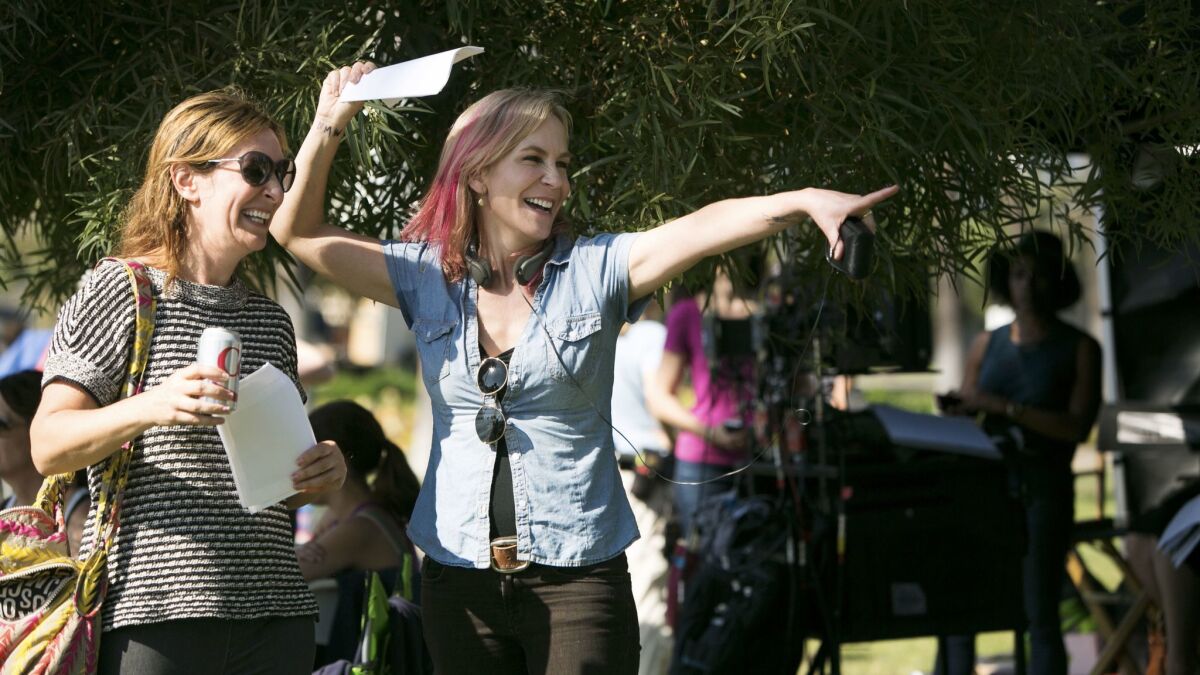 Marti Noxon, right, on the set of Bravo's first scripted TV series, "Girlfriends' Guide to Divorce" in Echo Park.
