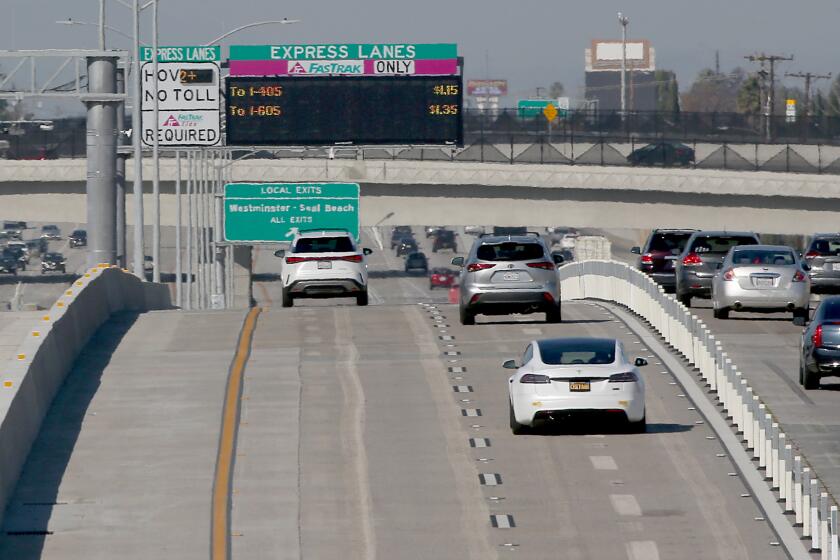 Huntington Beach, CA - FasTrak express lanes are open on the San Diego (405) Freeway from Costa Mesa to the San Gabriel River (605) Freeway on Friday, Dec. 1, 2023. The $2.16 billion project, which began in 2018, added one new lane in each direction as well as express lanes between state Route 73 and the San Gabriel River Freeway. (Luis Sinco / Los Angeles Times)