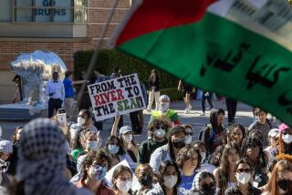 Los Angeles, CA - November 08: UCLA students march and rally for Palestine on the UCLA campus in Westwood Wednesday, Nov. 8, 2023 in Los Angeles, CA. (Brian van der Brug / Los Angeles Times)