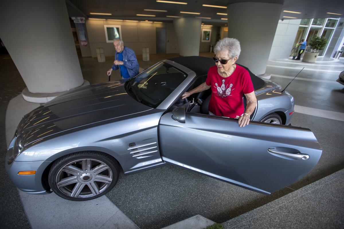 Lillian Solomon with her Crossfire convertible.