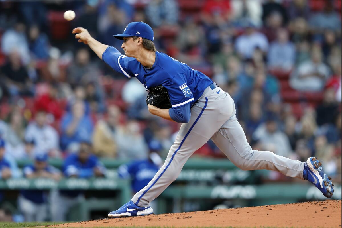 Kansas City Royals' Brady Singer pitches during the first inning of a baseball game against the Boston Red Sox, Saturday, Sept. 17, 2022, in Boston. (AP Photo/Michael Dwyer)