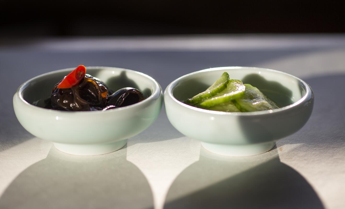 Wood ear fungus and cucumber soaked in special paste are the first course in the nine-course tasting menu.