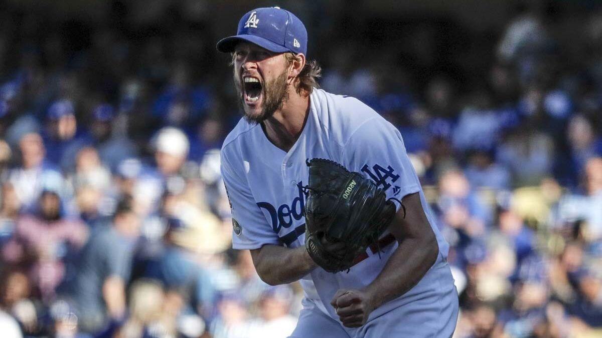 Clayton Kershaw emotes while pitching against Milwaukee in Game 5 of the National League Championship Series at Dodger Stadium.