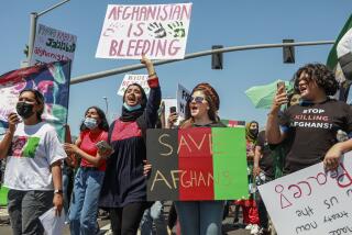 Afghans and supporters march down Pacific Coast Highway during a Stop Killing Afghans rally and march on Saturday, August 28, 2021 in Downtown San Diego.(Photo by Sandy Huffaker)