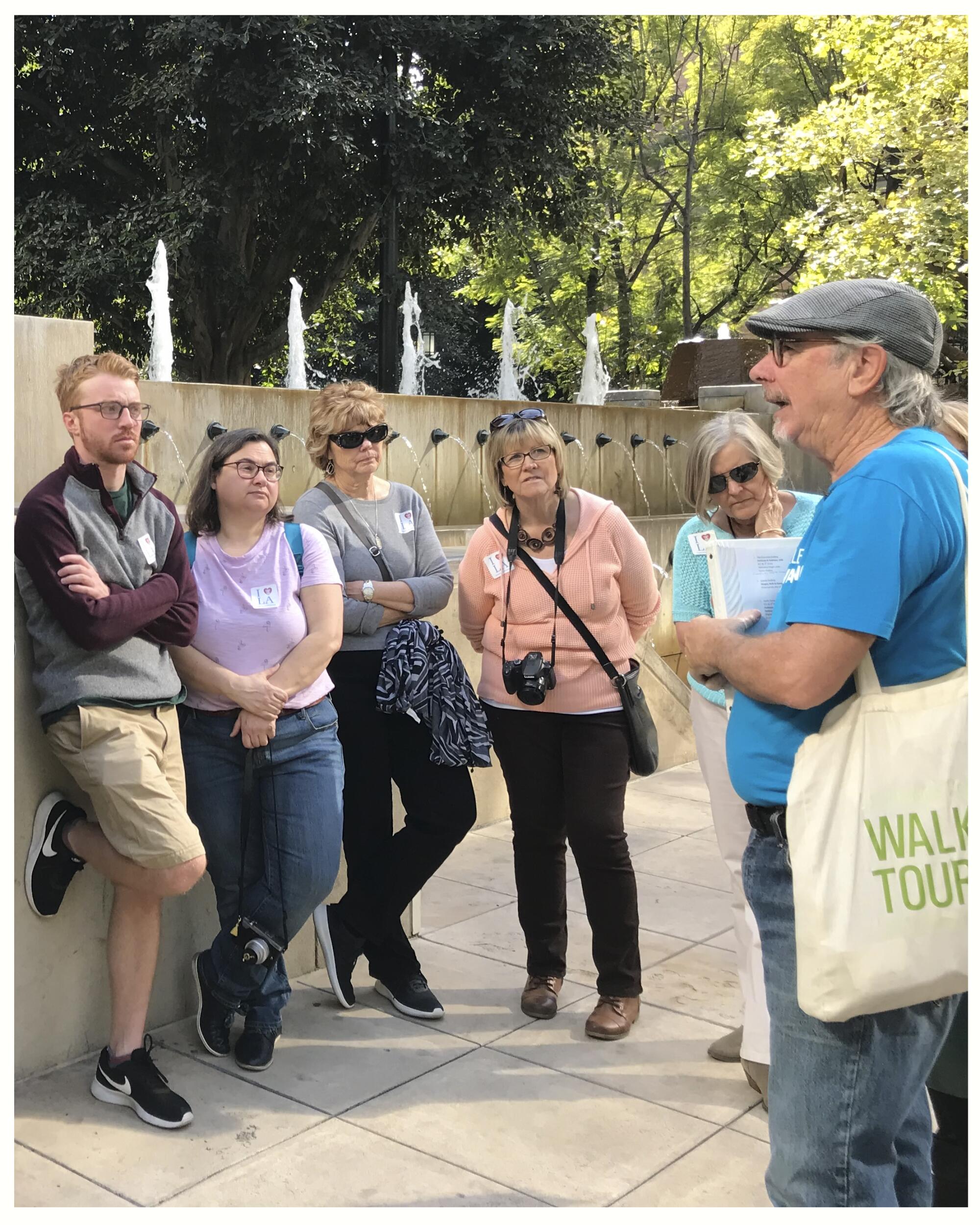 People gather for an L.A. Conservancy walking tour