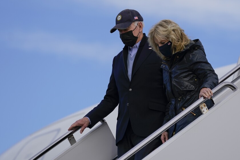 Omicron variant clouds Biden's efforts to show pandemic progress - Los Angeles Times 2 President Biden and First Lady Jill Biden leaving Air Force One