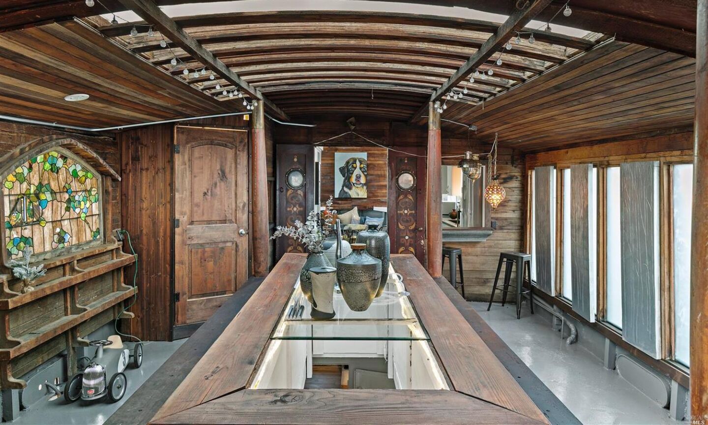 The decommissioned navy vessel boasts two bedrooms, a bathroom and bohemian living spaces in 1,200 square feet.