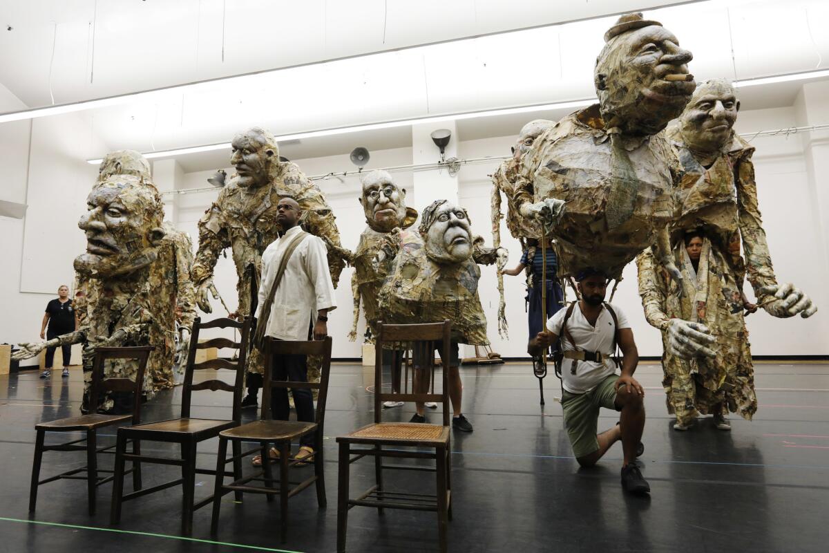 The cast of the opera 'Satyagraha,' rehearse at the Dorothy Chandler Pavilion in downtown Los Angeles.