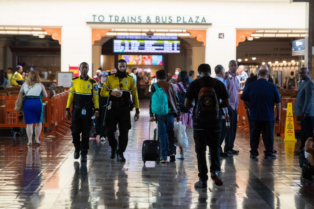 Metro security officers patrol at Union Station on Monday.