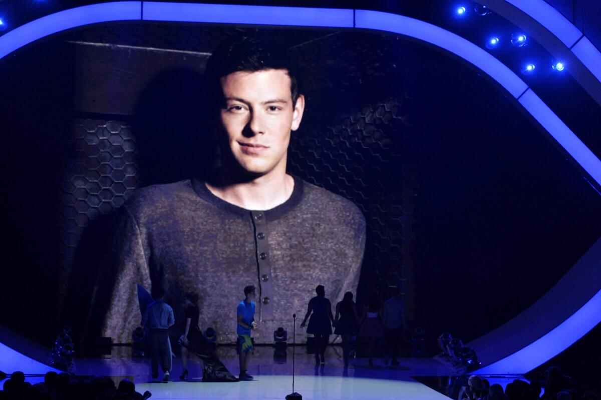 Cory Monteith is pictured on screen at the Teen Choice Awards in August as a tribute to the late actor.