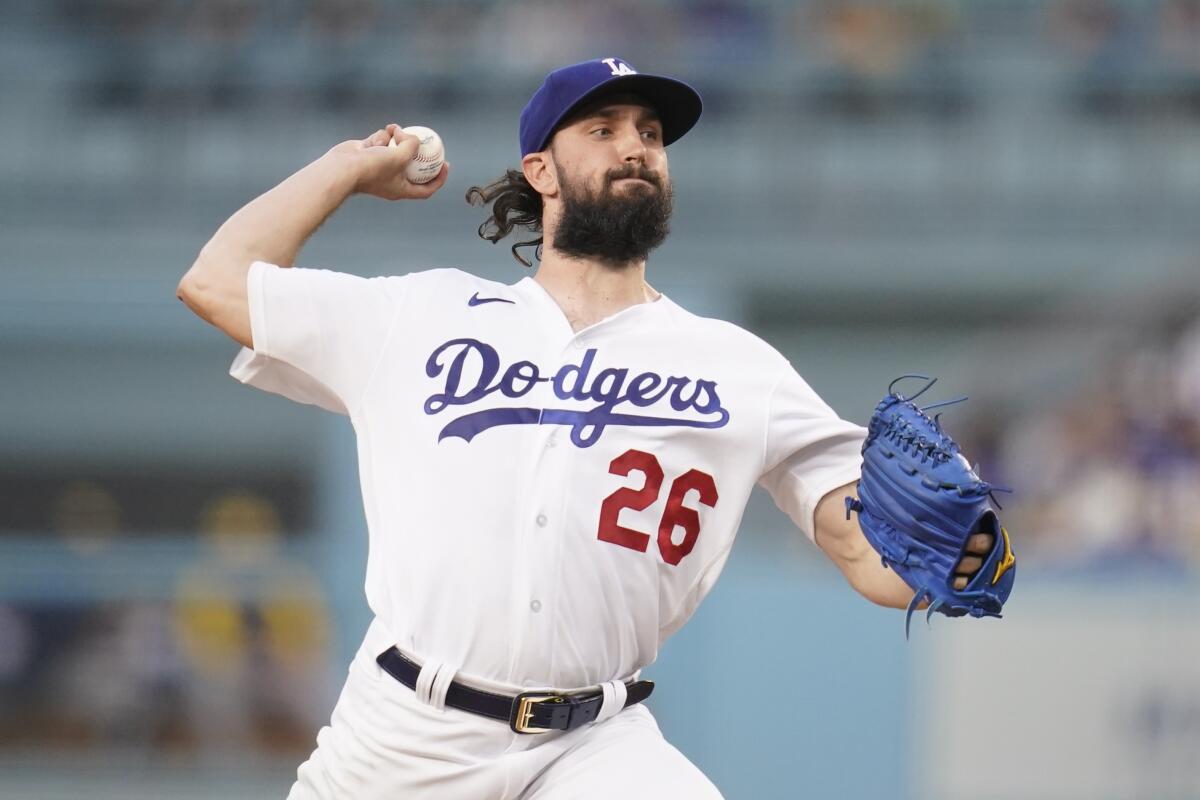 Dodgers starting pitcher Tony Gonsolin delivers against the Milwaukee Brewers on Aug. 23.