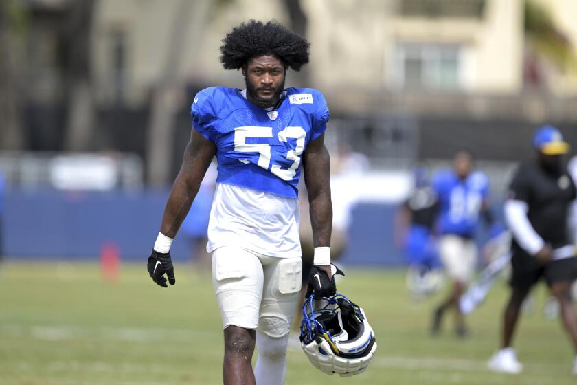 Rams linebacker Ernest Jones walks off the practice field.