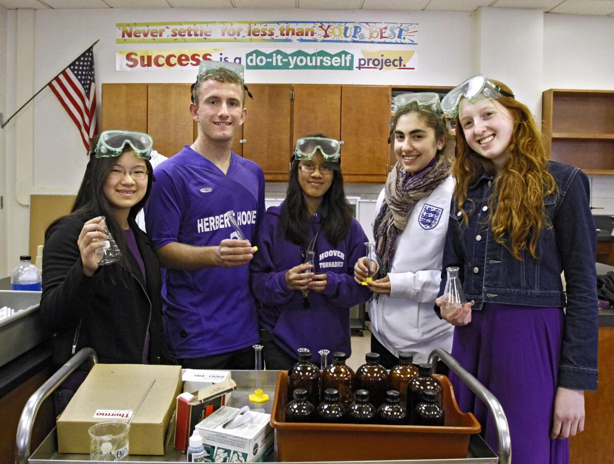 Hoover High School students, (l-r) junior Meagan Yuen, senior Jacob Deyell, juniors Charis Ramirez, and Daphne Bogosian and sophomore Kristina Laue, who will compete in a regional competition of the National Science Bowl tomorrow, are shown at the Glendale school on Friday, January 31, 2014. The regional battle of brains will determine if these students will compete in the national finals in Washington, D.C.