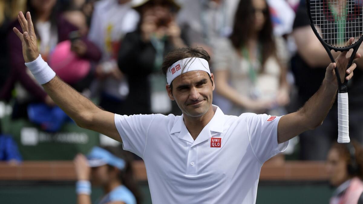 Roger Federer reacts after defeating Peter Gojowczyk at the BNP Paribas Open.