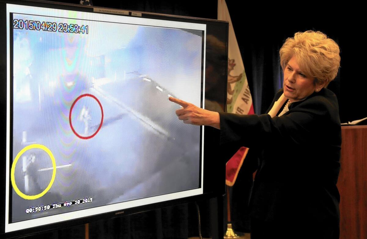 San Diego County Dist. Atty. Bonnie Dumanis guides the media through a surveillance video showing the shooting of Fridoon Nehad by Officer Neal Browder.