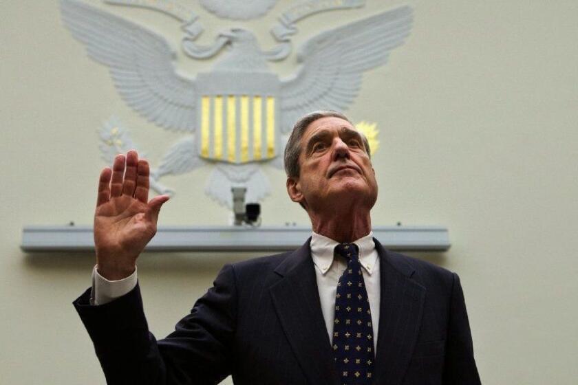 FILE - In this June 13, 2013 file photo, FBI Director Robert Mueller is sworn in on Capitol Hill in Washington prior to testifying before the House Judiciary Committee as it holds an oversight hearing on the FBI. On Friday, Feb. 15, 2018, The Associated Press has found that stories circulating ...