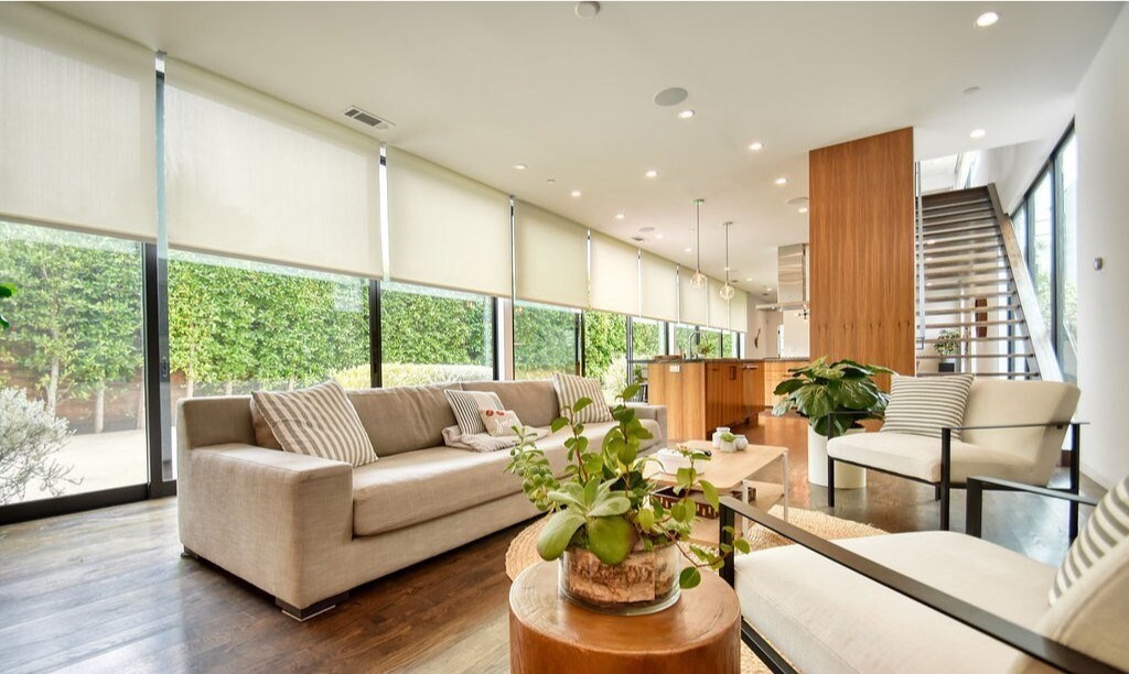 Built in 2016, the two-story contemporary boasts warm wood accents both inside and outside.