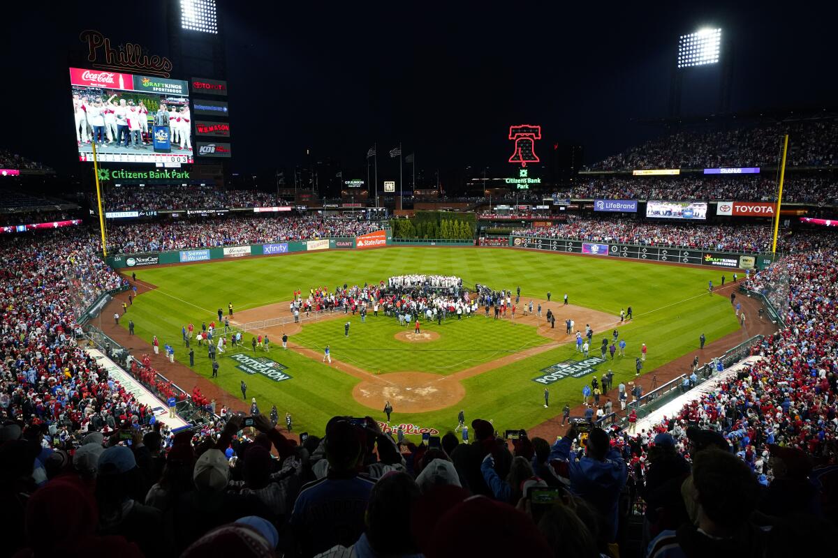 The Philadelphia Phillies celebrate after winning the NLCS against the San Diego Padres.