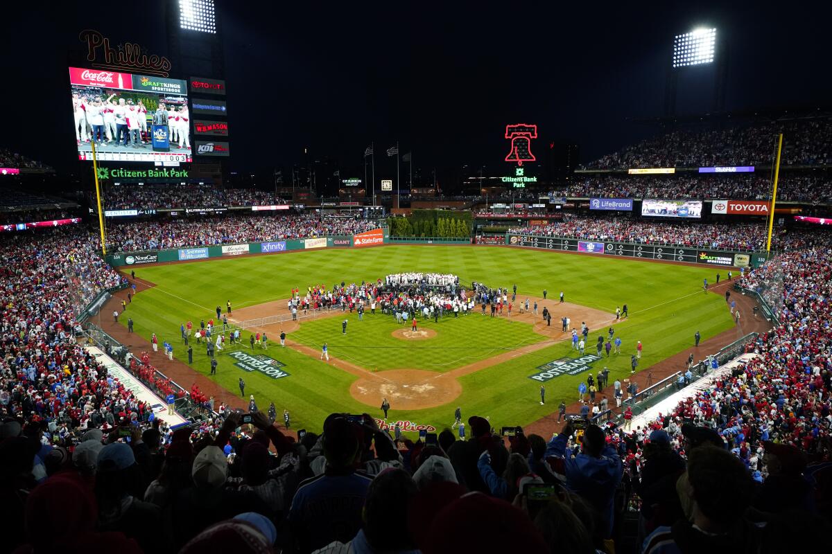 Phillies fans celebrate World Series berth climbing greased poles after  National League championship