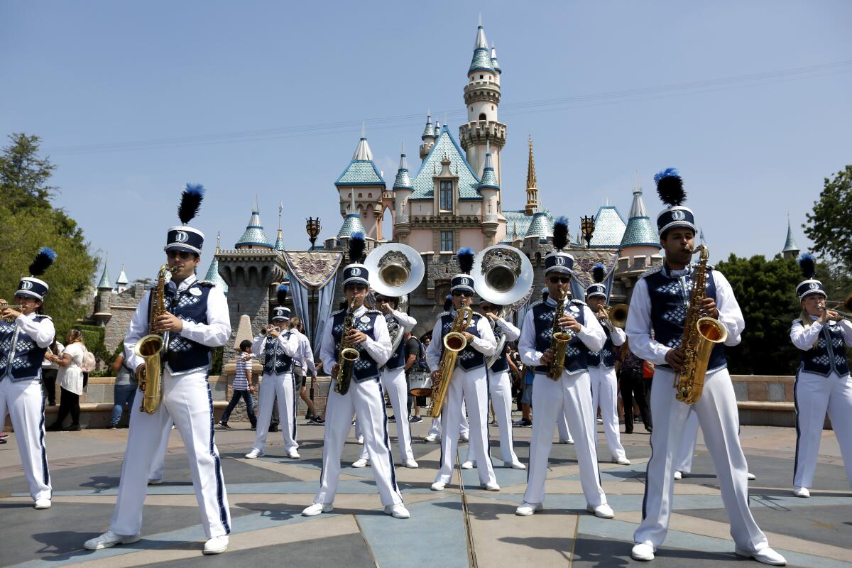 A band plays at Disneyland on June 30, 2017. The theme park won't host Grad Nite 2020 because it closed due to coronavirus concerns.