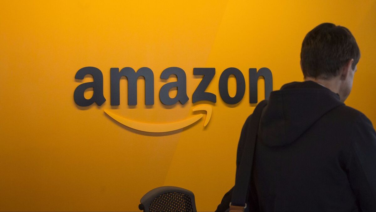 A visitor checks in at the Amazon corporate headquarters in Seattle, Wash.