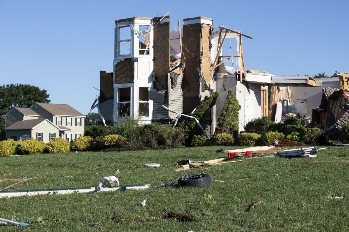 Homes damaged from the remnants of Hurricane Ida on Josephine Lane in Mullica Hill, N.J. on Thursday, Sept. 2, 2021. (Monica Herndon/The Philadelphia Inquirer via AP)
